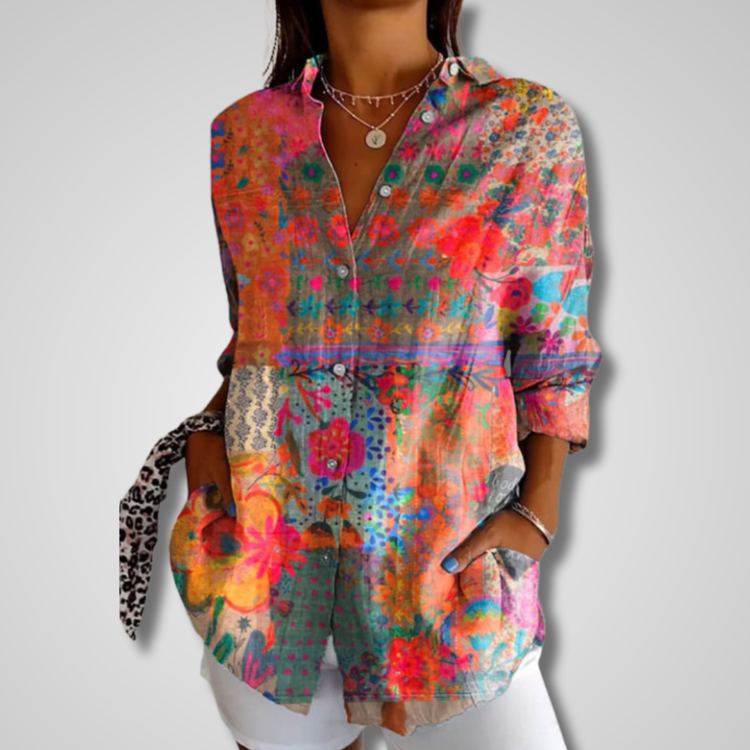 Women's vibrant artistic print bohemian button-up blouse with long sleeves & v-neck. Perfect for casual wear.