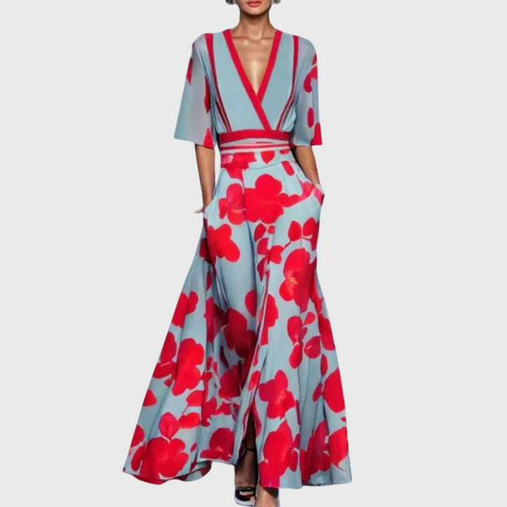 Feminine women's floral V-neck flowy maxi dress. Vibrant print & contrast trim, ideal for a stylish summer look.