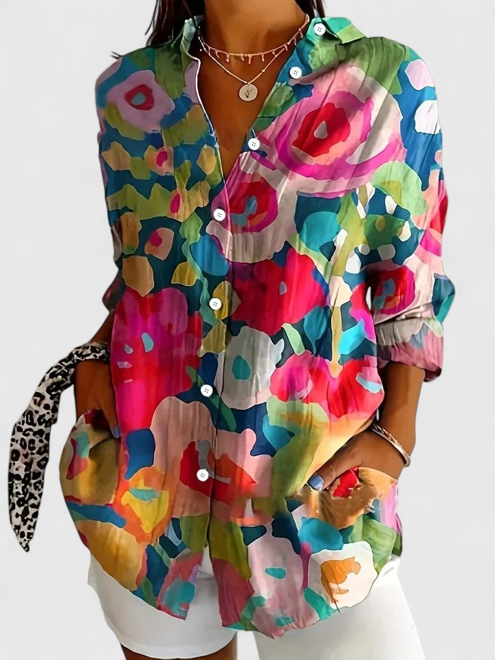 Abstract floral print women's long sleeve blouse, a vibrant and comfortable top for modern fashion.