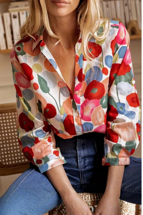 Women's vibrant floral button blouse with long sleeves, relaxed fit, perfect for spring/summer fashion.