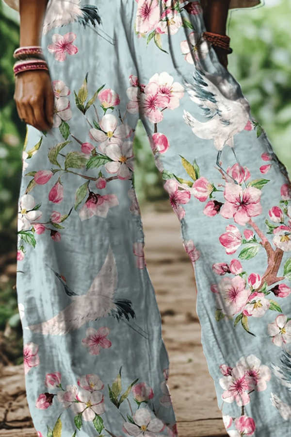 Relaxed fit women's cropped floral pants, embodying a boho chic aesthetic.