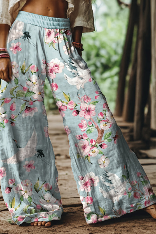Women's summer cropped pants with a colorful floral print, great for resort wear.