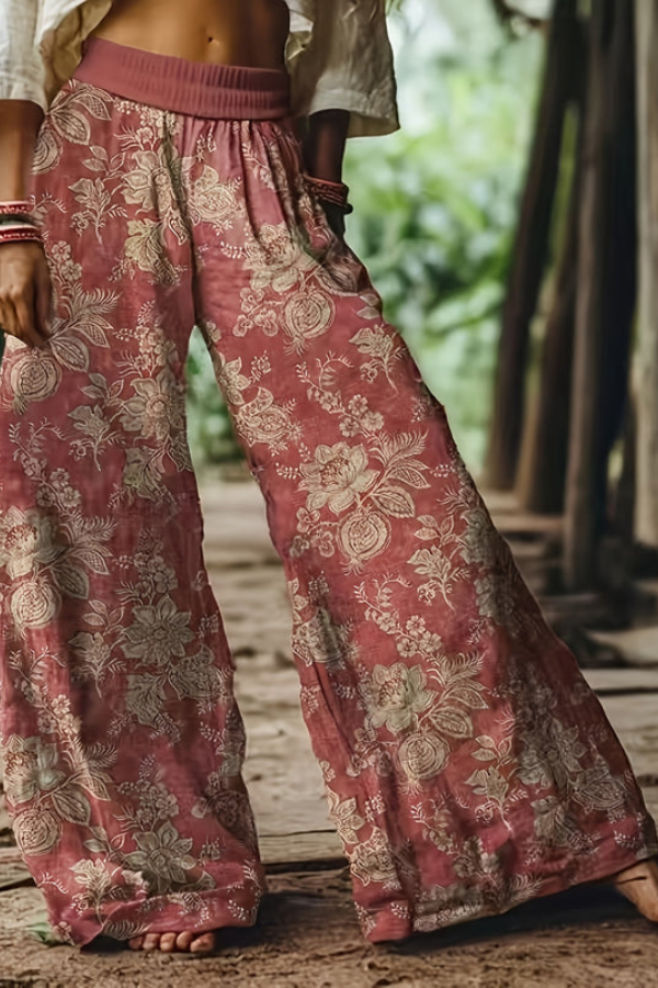 Comfortable women's cropped floral pants in a bright pink and red summer print.