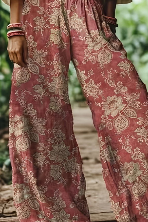 Vintage-inspired women's cropped pants featuring a blue floral design, casual style.