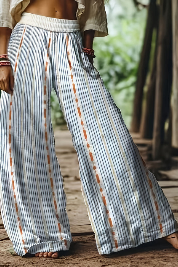 Women's bright floral cropped pants in a relaxed fit, perfect for vacation.