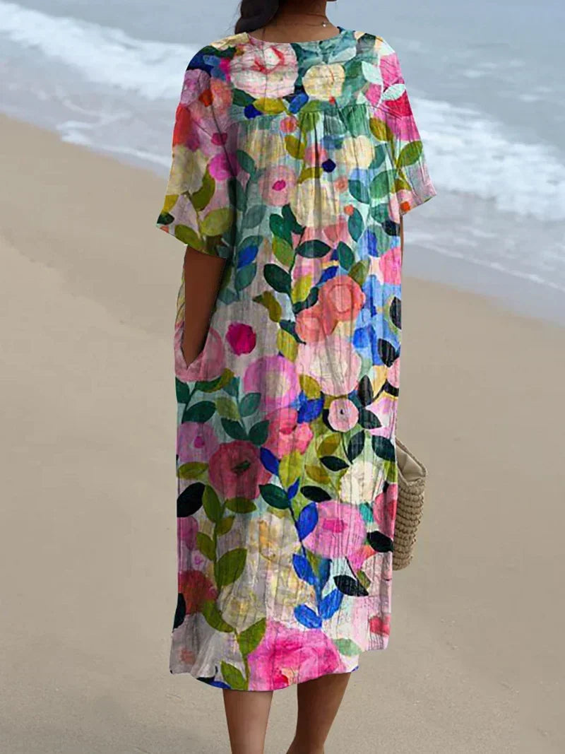 Comfortable women's floral garden print flowy sundress, ideal for spring and summer casual wear. Vibrant style.