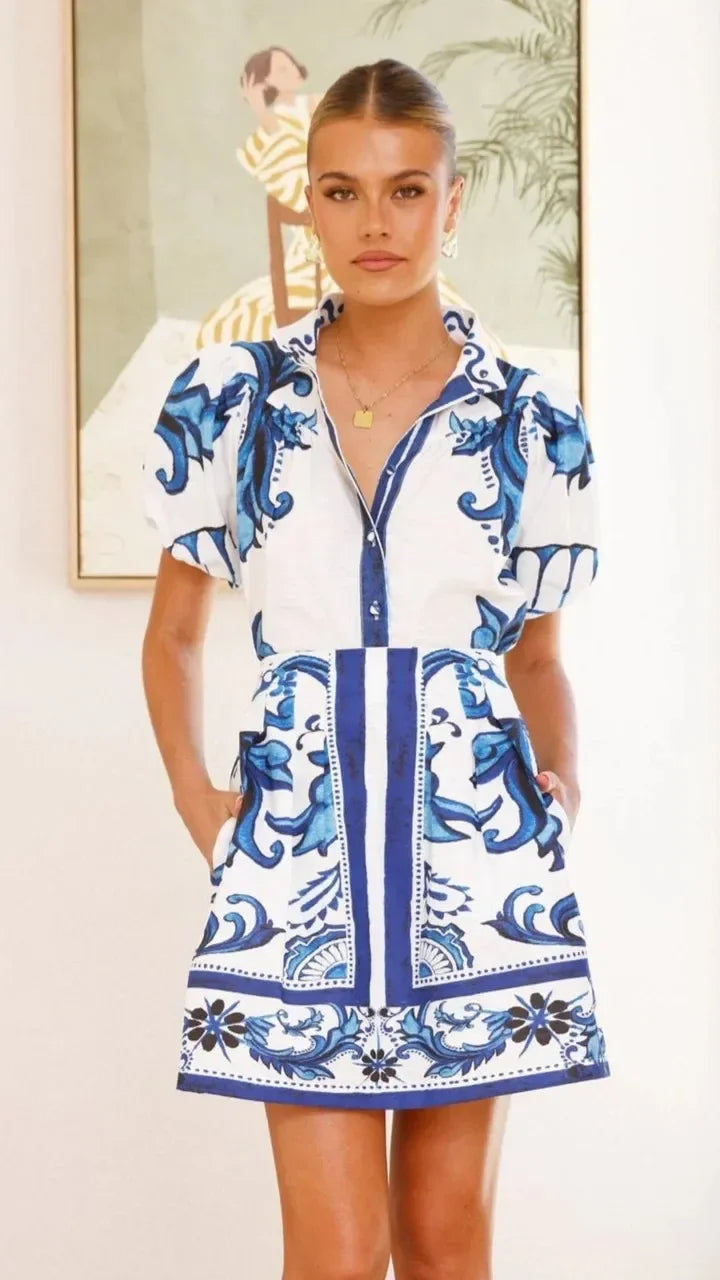 Stylish women's floral puff sleeve mini dress, elegant for any special event.