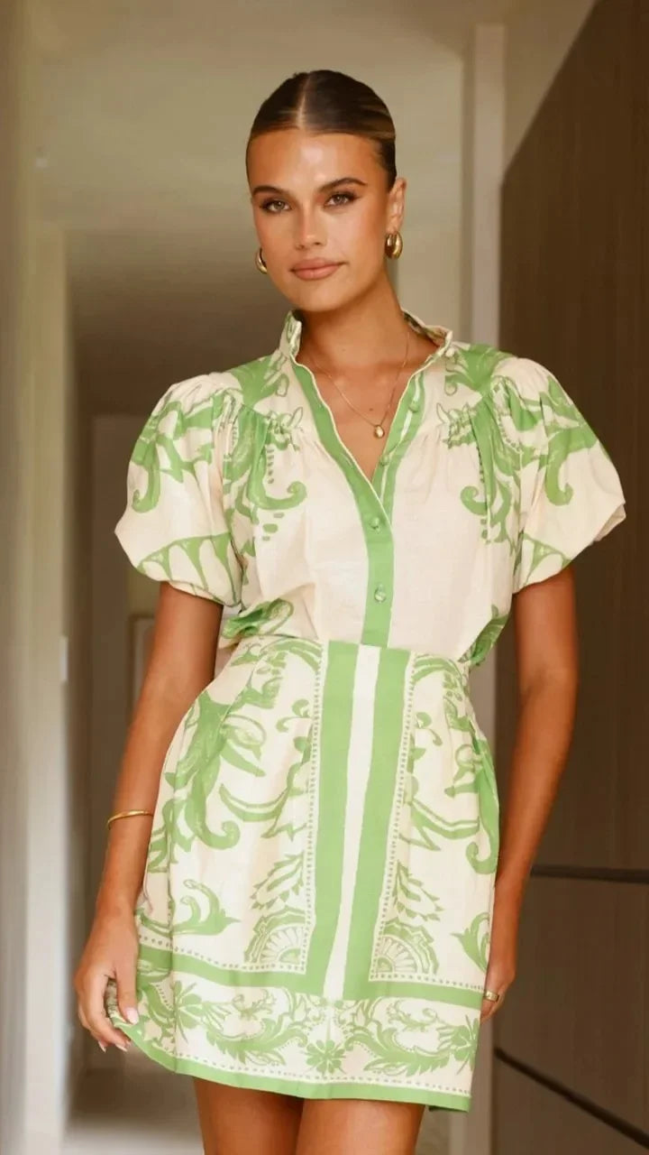 Pretty women's floral puff sleeve cocktail dress, perfect for elegant parties.