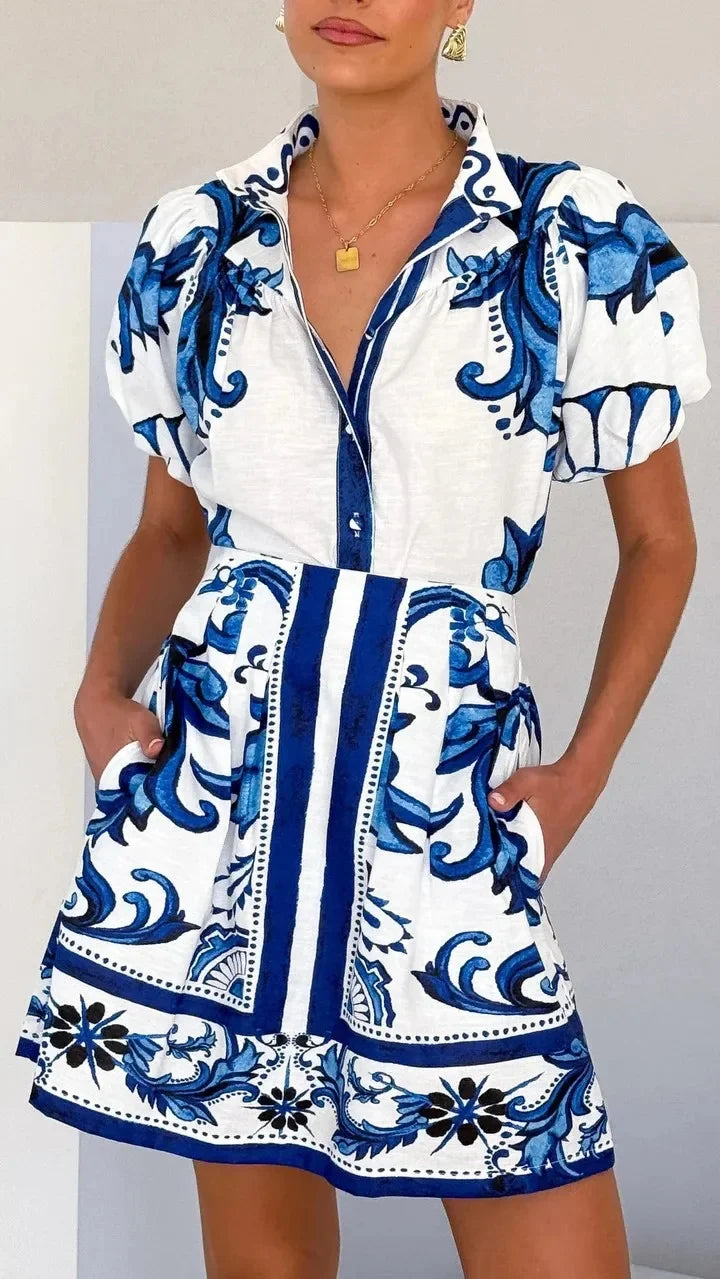 Women's party floral puff sleeve cocktail dress, elegant and flattering design.