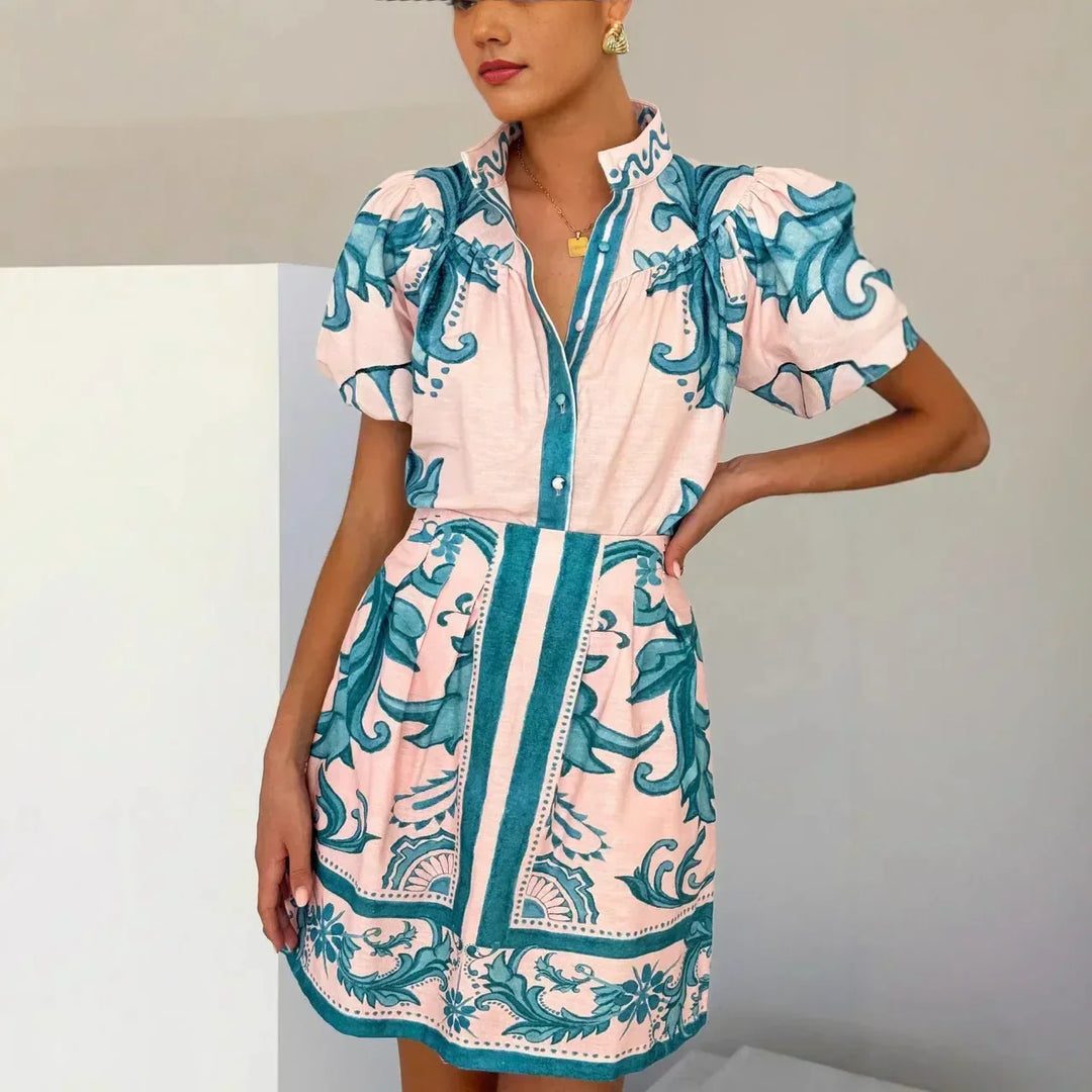 Stylish floral puff sleeve cocktail dress for women, elegant party wear.