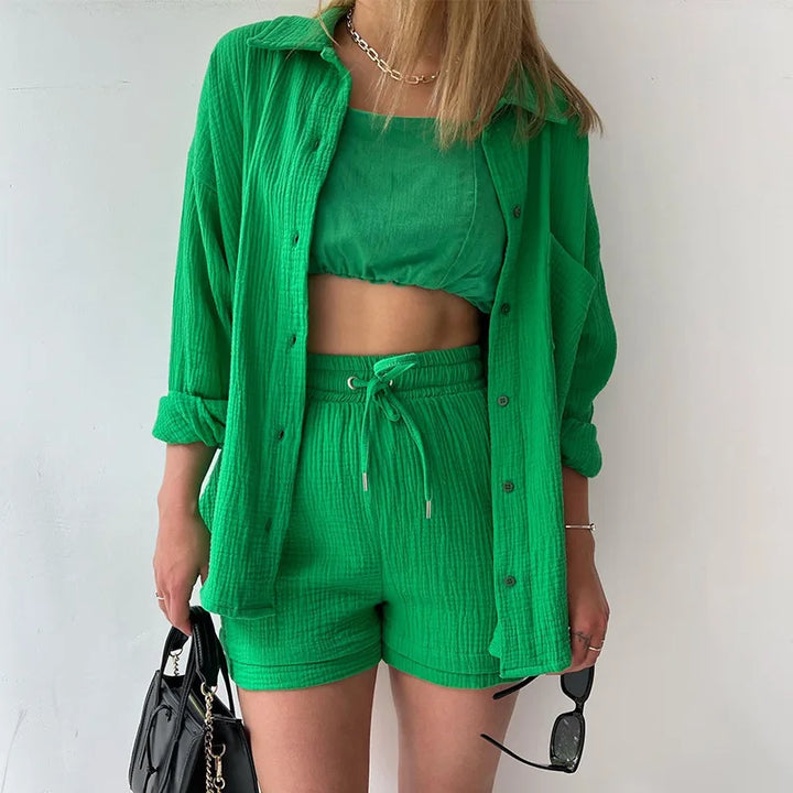 Button-up turquoise women's flare shorts set, chic casual lounge wear.