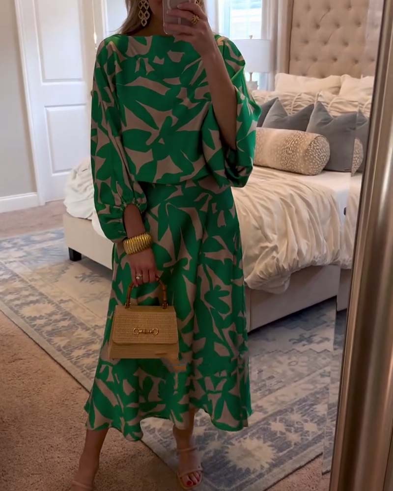 Women's vibrant printed two-piece set with elegant lantern sleeves, perfect for spring/summer casual chic.