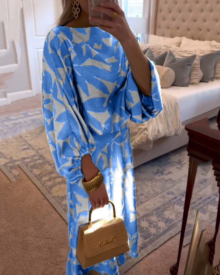 Casual yet elegant women's two-piece outfit: printed top & skirt with distinctive lantern sleeves.
