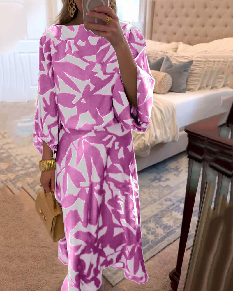 Spring fashion essential: women's printed two-piece skirt set with flattering lantern sleeve design.