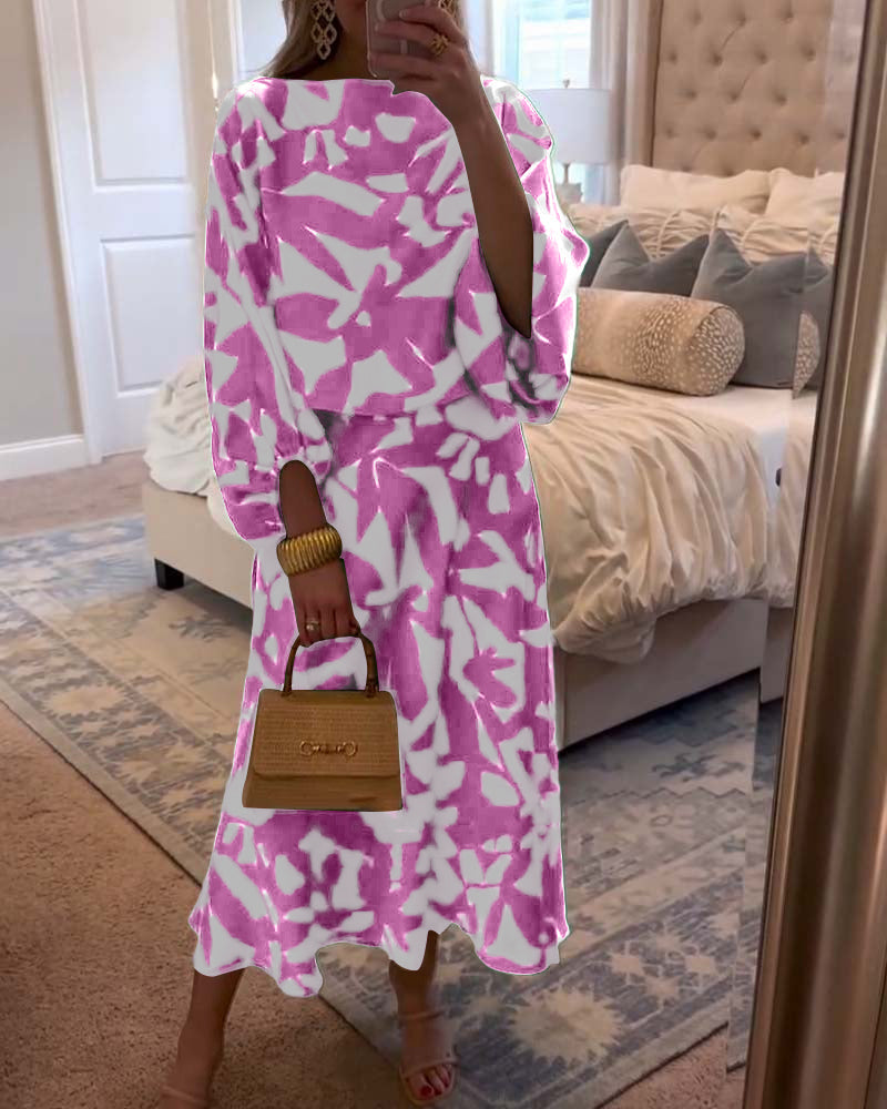 Stylish women's two-piece set featuring a unique print and trendy lantern sleeves for a modern look.
