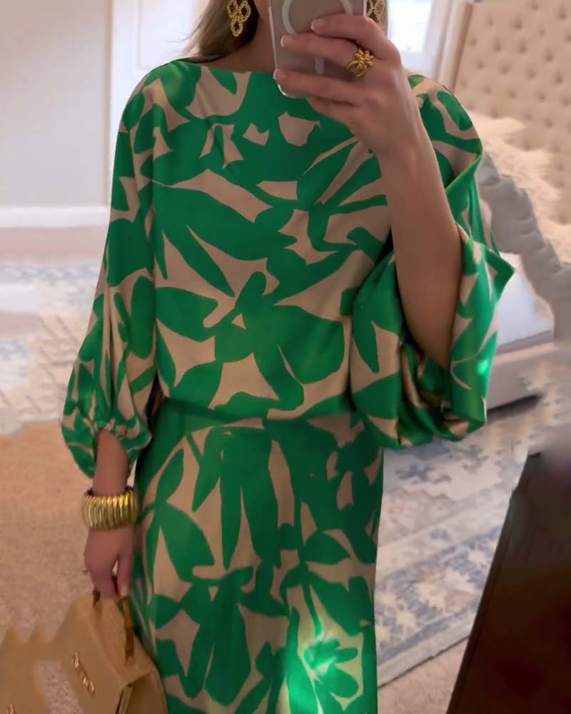 Versatile women's matching two-piece set, featuring a beautiful print and stylish lantern sleeve detail.