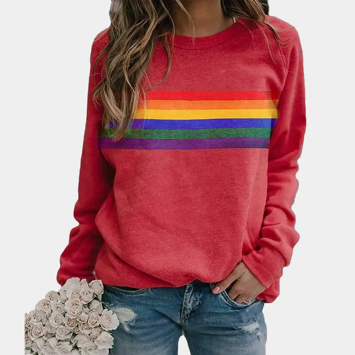 Women's casual rainbow stripe crewneck sweatshirt. A cozy, colorful everyday pullover for a vibrant look.