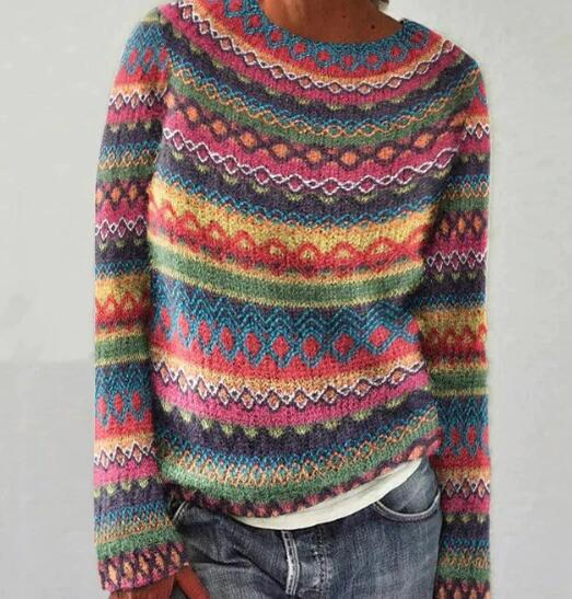 Cozy jacquard striped knit sweater for women, featuring a loose fit & round neck. Vibrant colors for winter fashion.