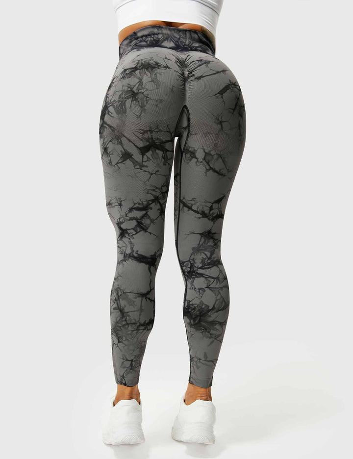 Stylish women's tie-dye activewear leggings for workout & everyday comfort. Trendy yoga pants.