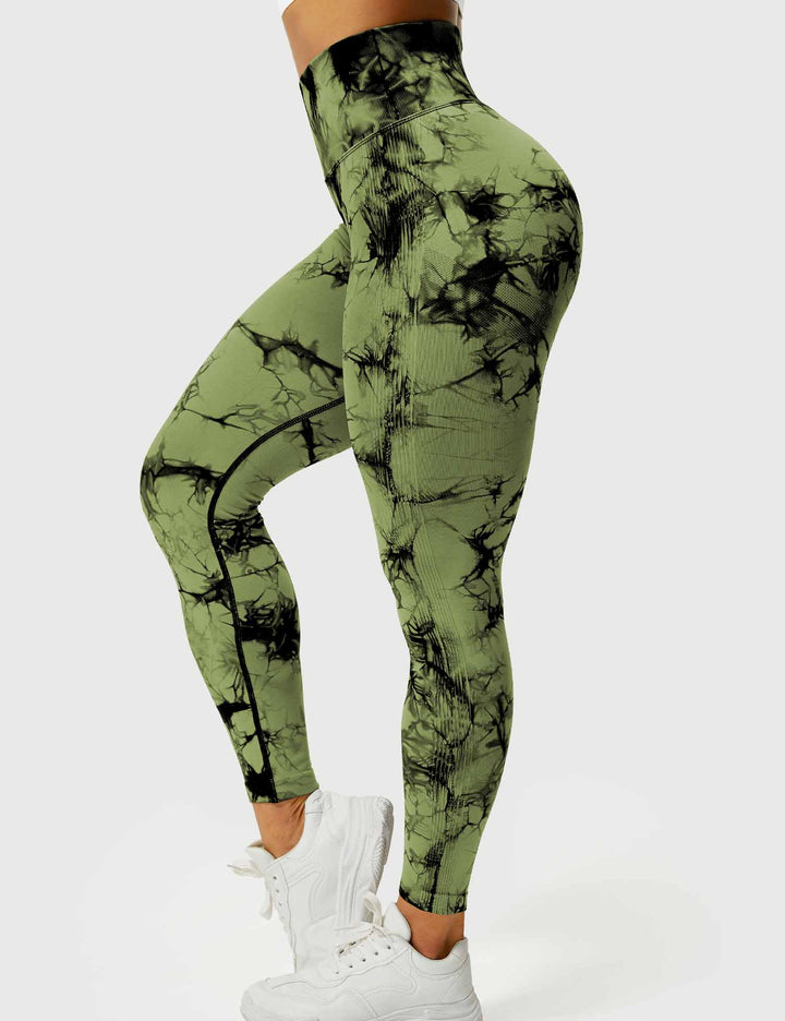 Vibrant tie-dye high-waist leggings for women, ideal for stylish activewear and flexible fitness.