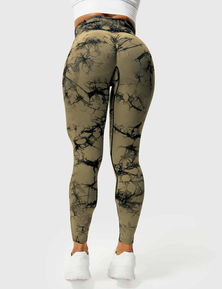 Fashionable tie-dye activewear leggings for women. High-waist design for comfort & flexibility.