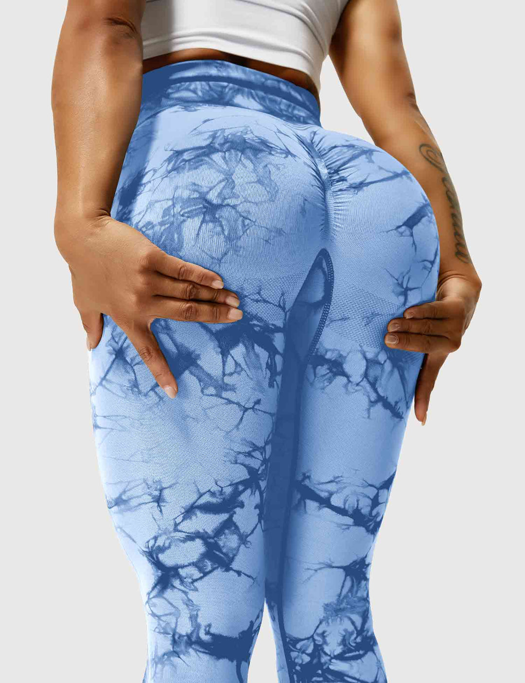 Women's vibrant tie-dye fitness leggings, designed for comfort and style in any active pursuit.