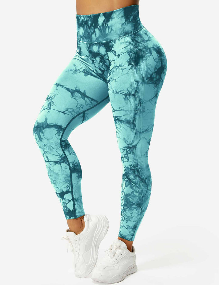 Fashionable tie-dye workout leggings for women. High-waist design for comfort and active style.