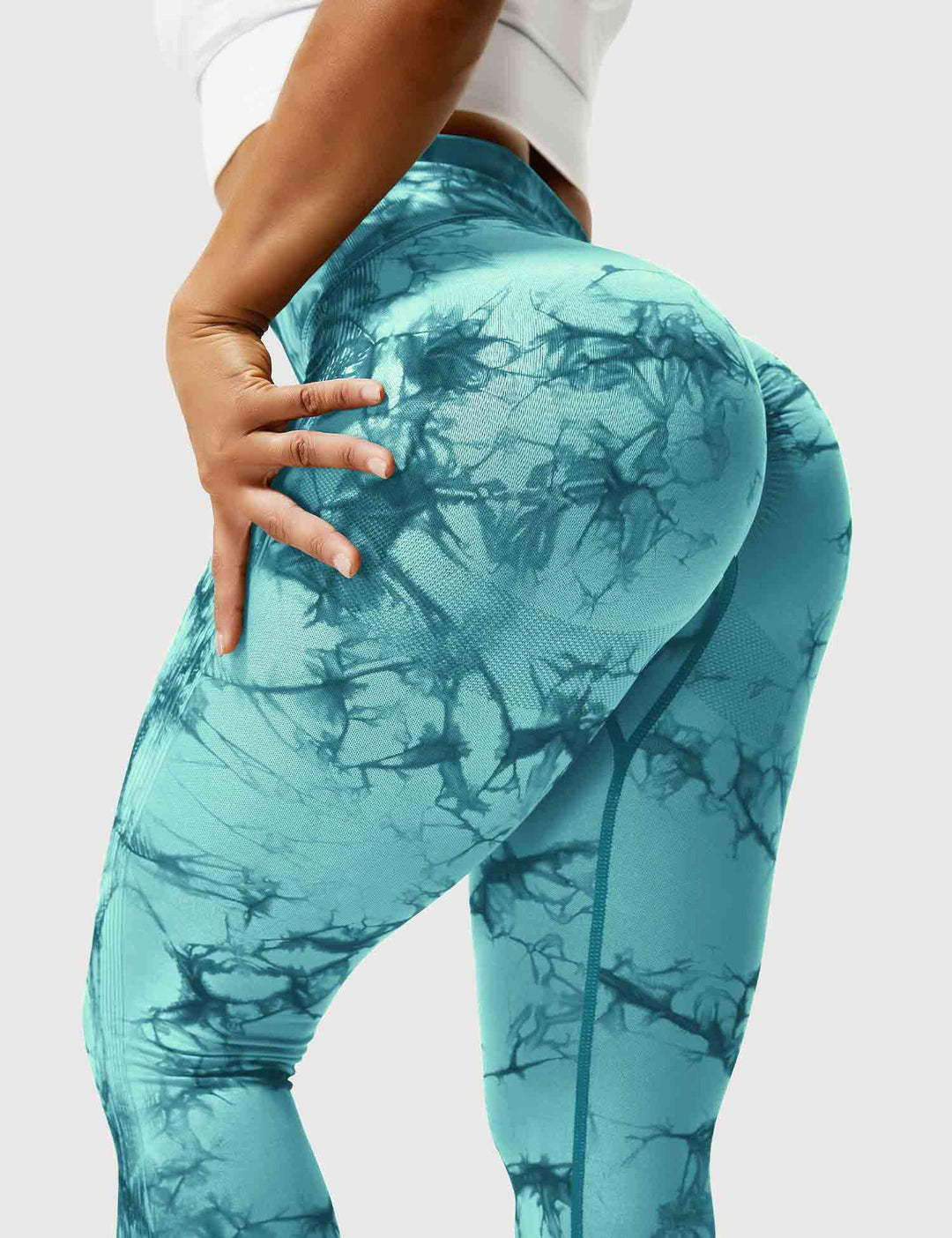 Vibrant tie-dye women's high-waist leggings, offering style & comfort for active lifestyles.