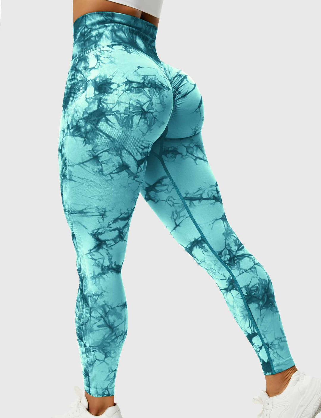 Stylish tie-dye high-waist leggings for women. Comfortable fitness apparel & active style.