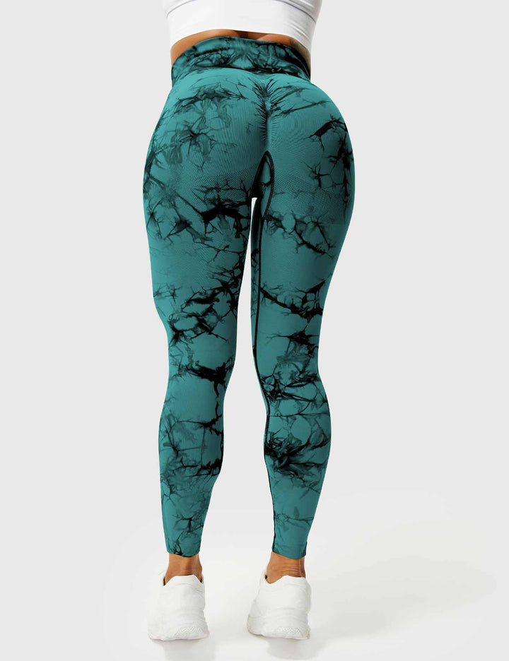 Flexible high-waist tie-dye women's leggings, ideal for fitness, activewear, & stylish comfort.