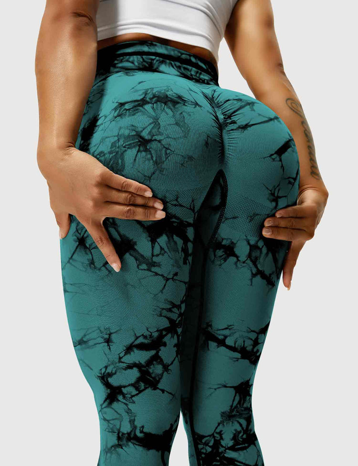 Soft tie-dye women's fitness leggings, perfect for active style, yoga, and comfortable workouts.