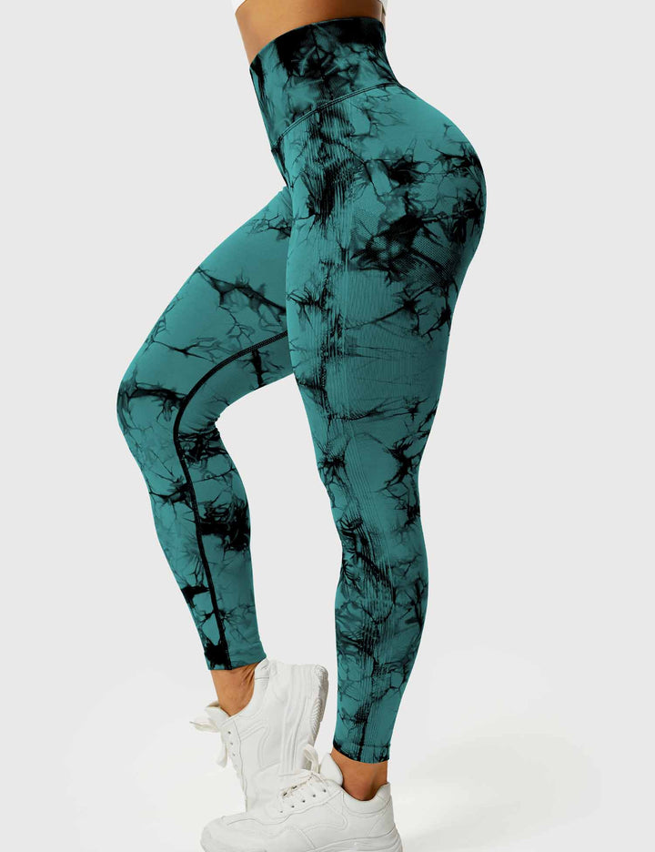 Comfortable tie-dye women's workout pants, ideal for yoga, gym, and flexible active lifestyles.