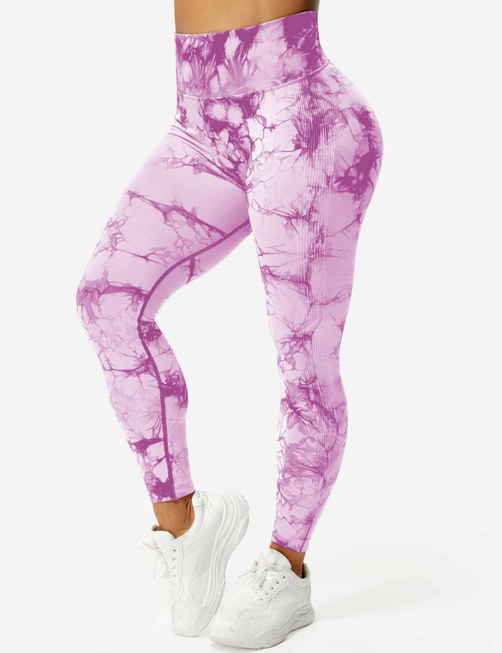 Vibrant women's tie-dye active leggings, high-waist for a stylish & comfortable fitness experience.