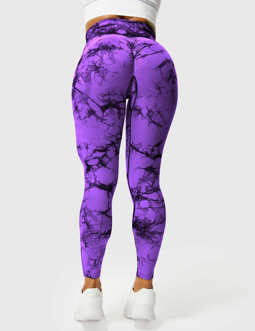 Soft women's tie-dye fitness leggings, offering ultimate comfort for workouts & activewear.