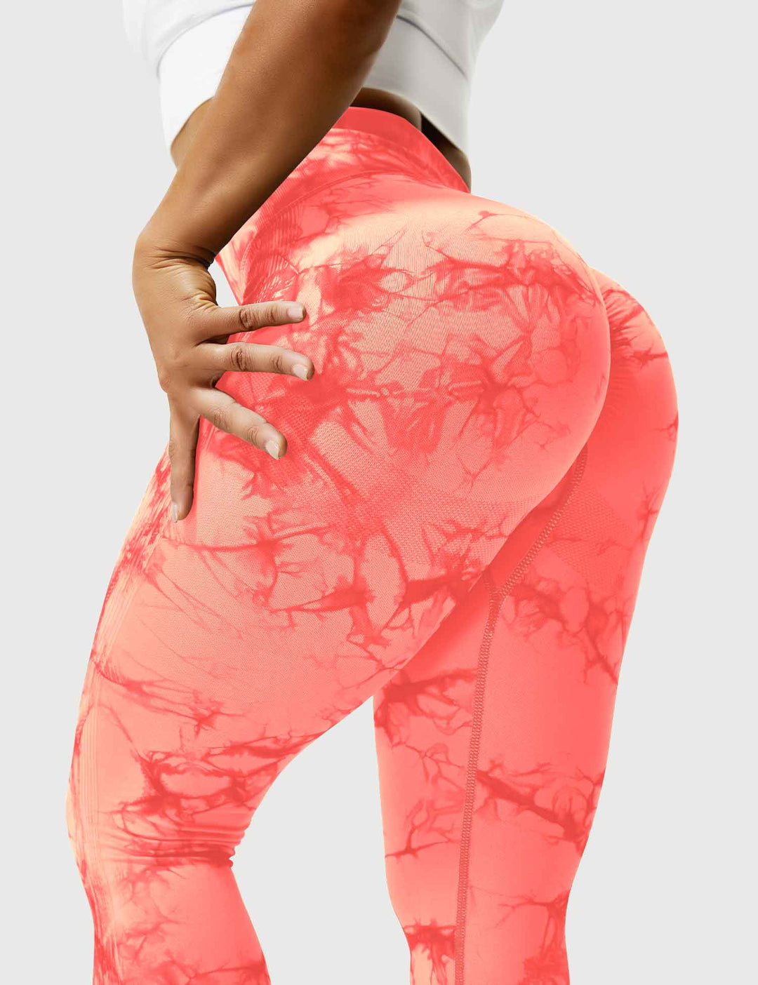 Women's vibrant tie-dye activewear leggings, designed for flexible movement & stylish fitness.