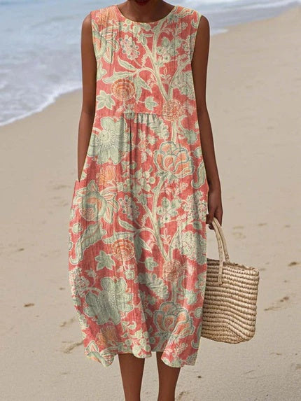 Women's vintage floral midi dress with pockets, offering boho chic style for effortless spring & summer fashion.