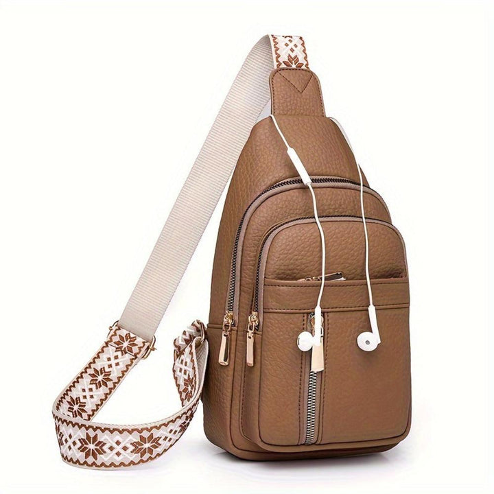 Black women's vintage leather crossbody bag, versatile chest purse for daily use & shoulder carry.