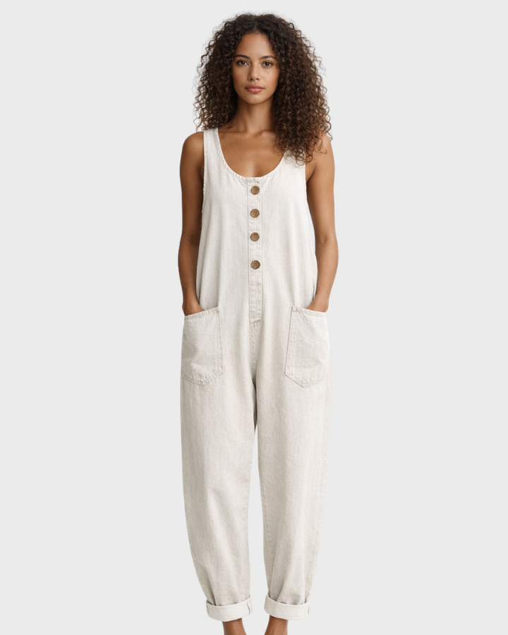 Women's loose fit denim overall jumpsuit. Vintage style with wide-leg design and practical adjustable straps. Casual.