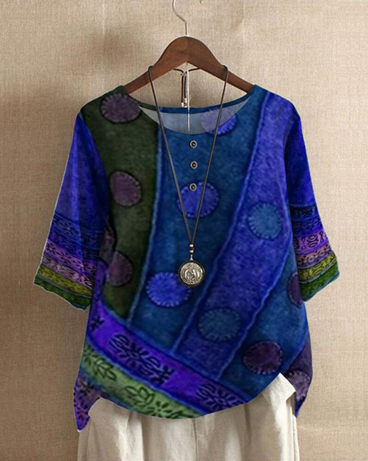 Vintage patchwork print tunic blouse for women, bohemian style, relaxed fit with three-quarter sleeves. Summer top.