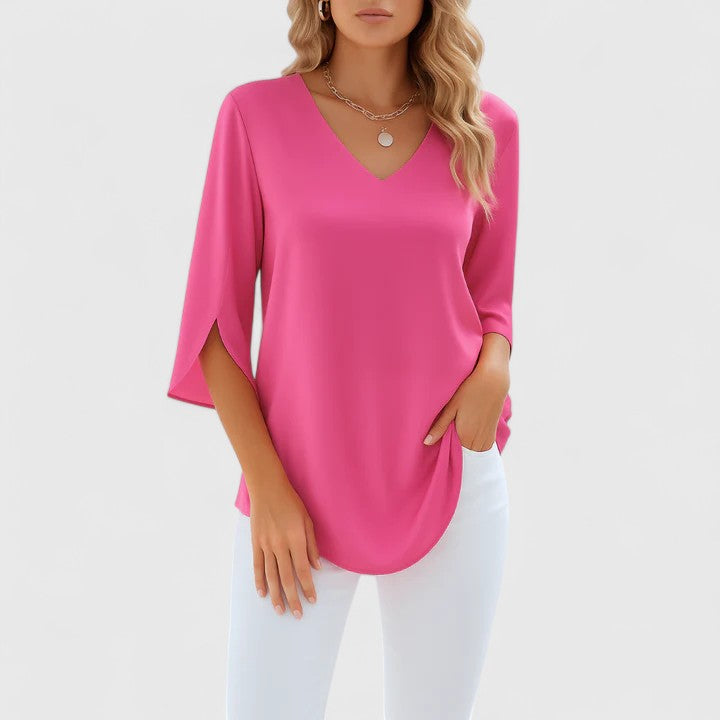 Chic women's Violetta V-neck blouse with a relaxed fit, perfect for elegant summer fashion.