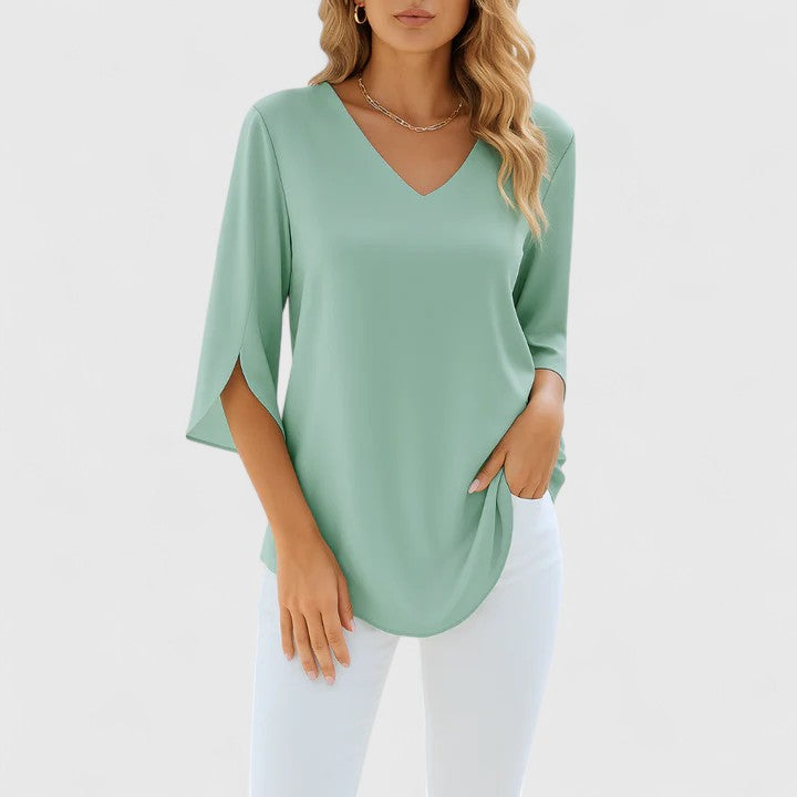 Fashionable women's Violetta V-neck blouse, a versatile elegant top for casual or day to night style.