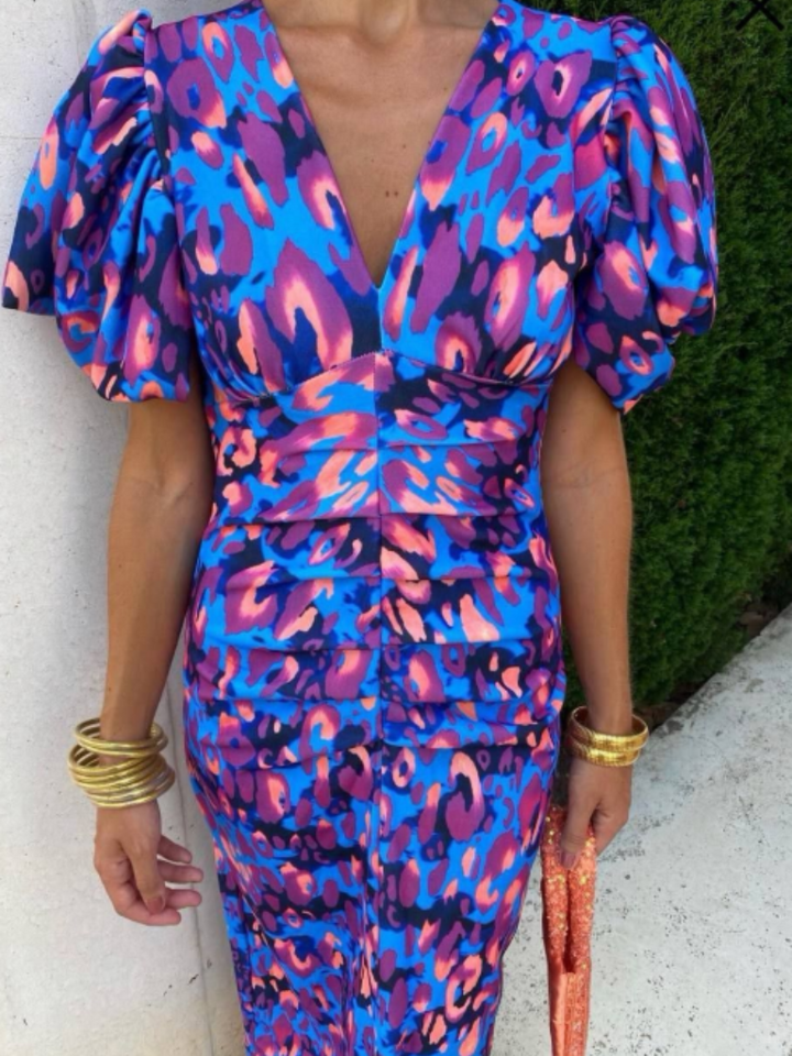 Women's elegant ruched midi dress, striking abstract print. Great for cocktail, party, and wedding guests.