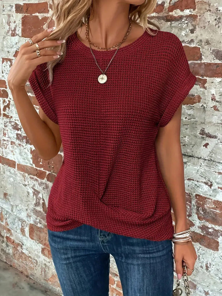 Comfortable women's round neck waffle twist front top, short sleeve casual shirt for everyday wear.