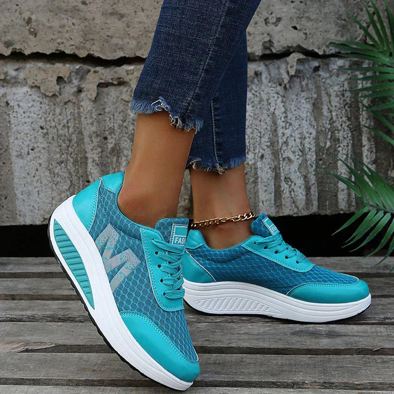 Comfortable & supportive women's walking sneakers with breathable upper for daily activity.