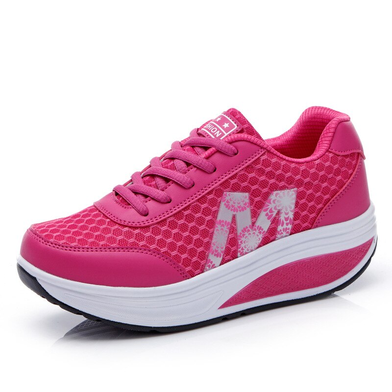 Lightweight women's walking shoes, breathable for activewear, offering cushioned foot support.