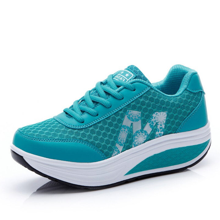 Comfortable women's sneakers, supportive design for walking, features breathable upper.
