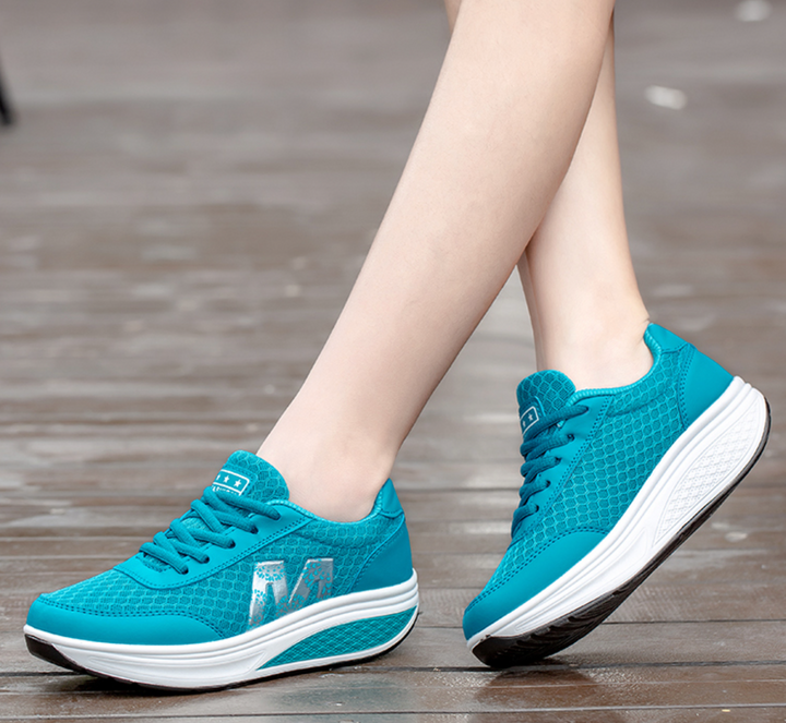 Supportive women's walking shoes, lightweight with a breathable upper for all-day comfort.