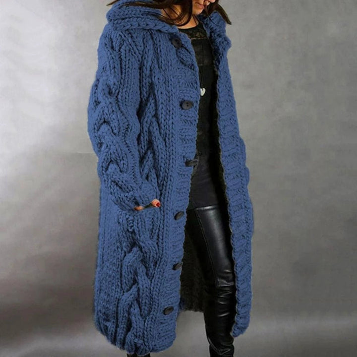 Women's warm cable knit maxi cardigan, perfect for cozy winter fashion and stylish layering.