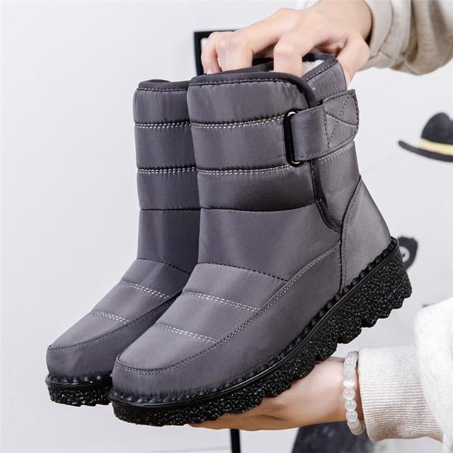 Stylish women's waterproof winter boots. Padded, warm, and non-slip for ultimate comfort in snow.