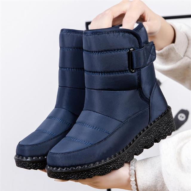 Durable women's cold weather boots. Waterproof & non-slip for outdoor winter adventures. Keeps feet warm.